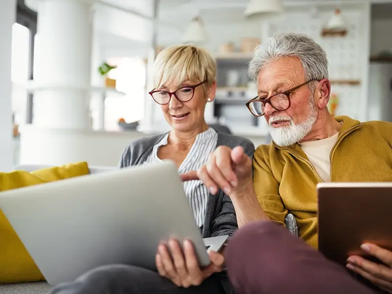 couple looking at laptop